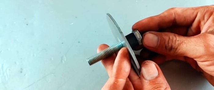 How to make a latch for a carriage-type door from leftover metal