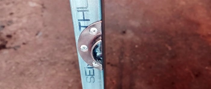 How to make a latch for a carriage-type door from leftover metal