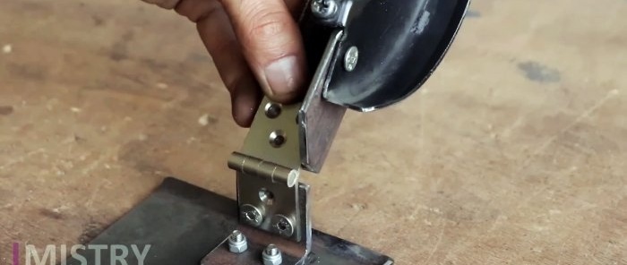 How to make a hand-held circular saw from a grinder using simple and affordable materials