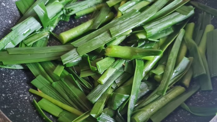 Dish with garlic arrows